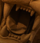 Extreme close-up of a Detroit tiger statue's open mouth and teeth